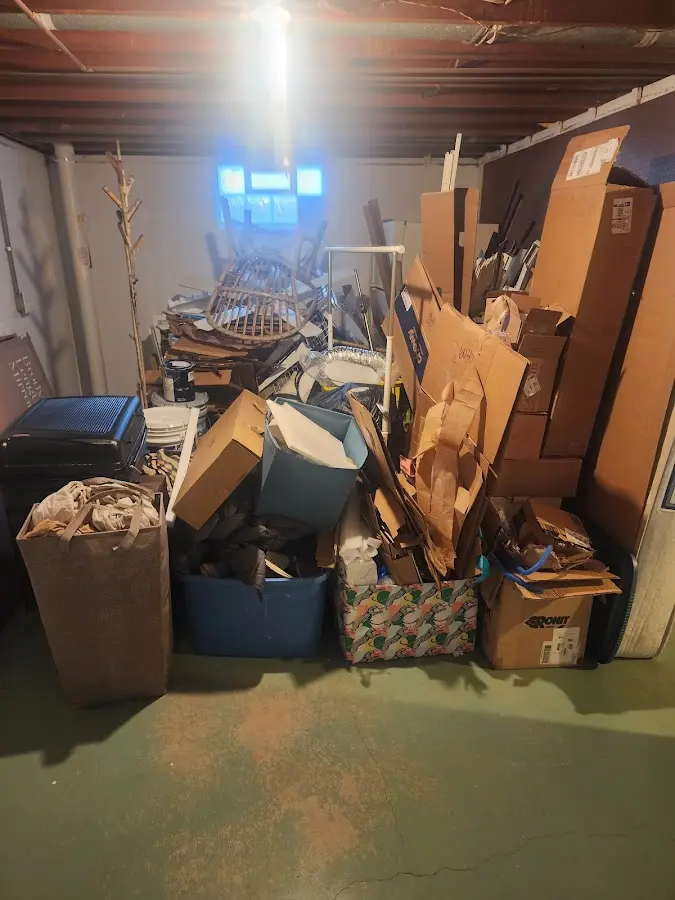 Roll-off dumpster container at job site for 2 Yard Dumpster Rental in Acushnet